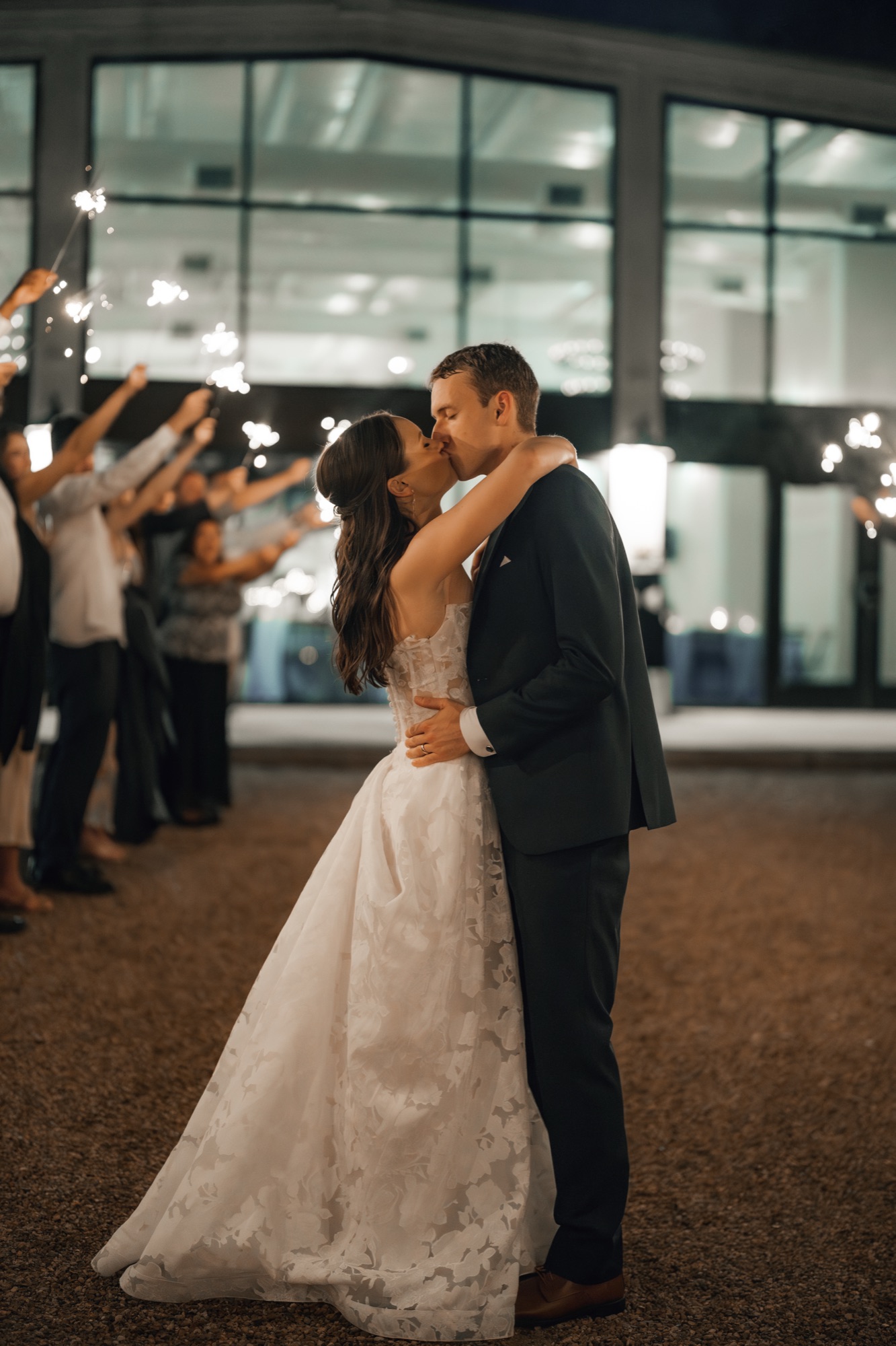 Katie and Zach's sparkler exit kiss